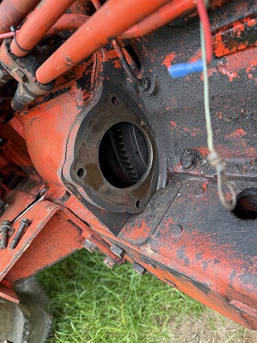 Starter motor removed exposing flywheel